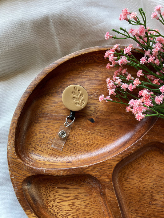 Embossed Badge reel