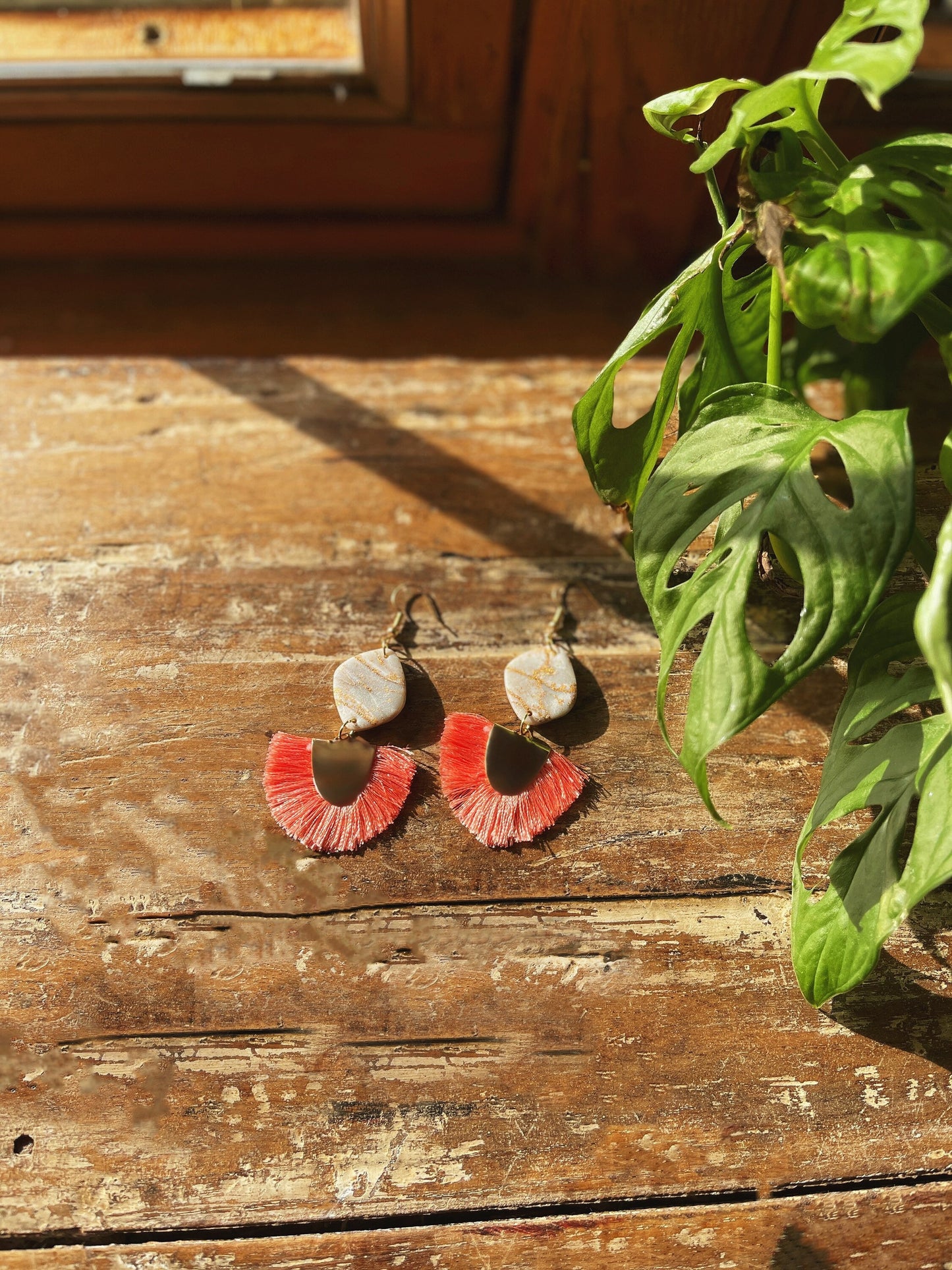 Gold marble tassel earrings